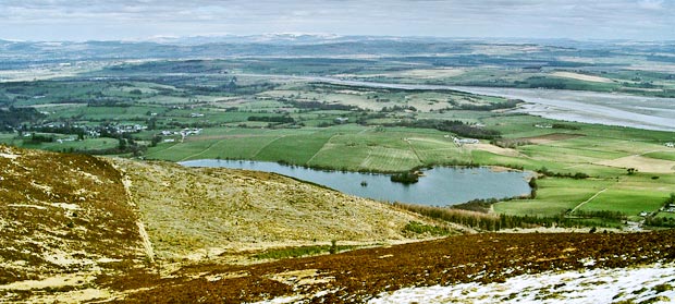 View looking north-eastward over Loch Kindar and the River Nith towards Glencaple and Caerlaverock, from near the top of Criffel