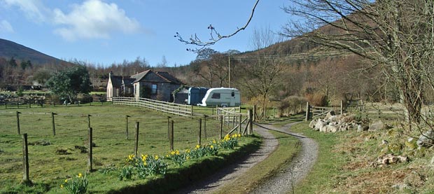 Track going up past the houses at Mid Glen