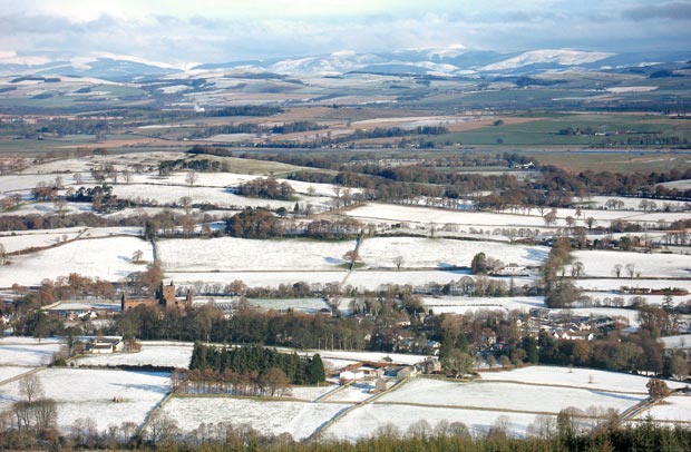 View over New Abbey towards Dumfries and the Moffat hills from Knockendoch