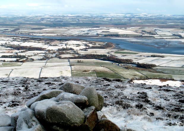 View towards Glencaple and the River Nith from the cairn on Knockendoch