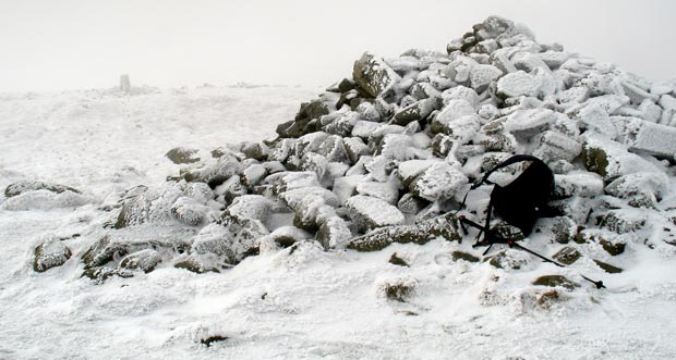 The Douglas's cairn on the top of Criffel in snow conditions