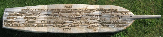 Boat seat at Carsethorn with names of passengers who sailed to the New World from here.