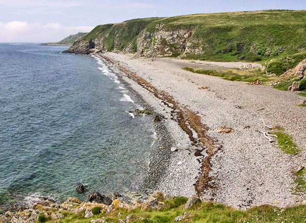 View along the length of the beach towards St Ninian's cave