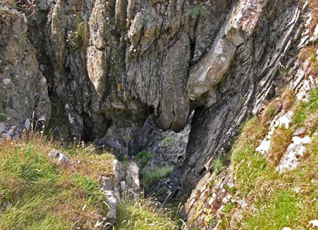 View of the Devil's Arch near the cliff top path