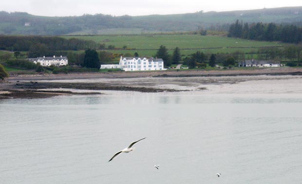 View over to Balcary Balcary Bay Hotel from the south west corner of Hestan Island.