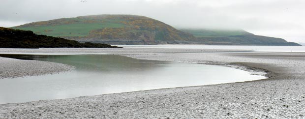 View north eastward towards Barcloy Hill and White Hill from the channel near Almorness.