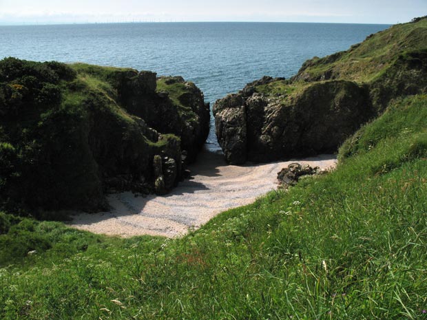 Sandy bay beside the old ruined house near Gutcher's Isle.