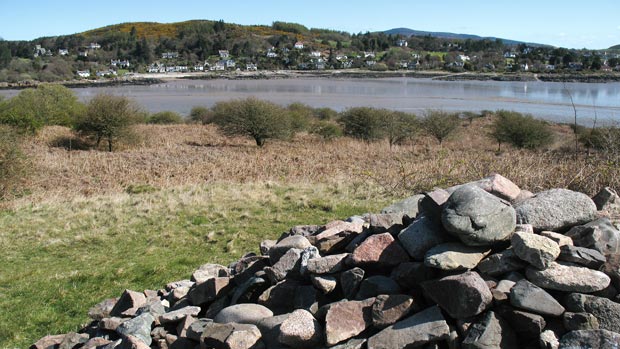 View of Rockcliffe from the cairn on Rough Island.