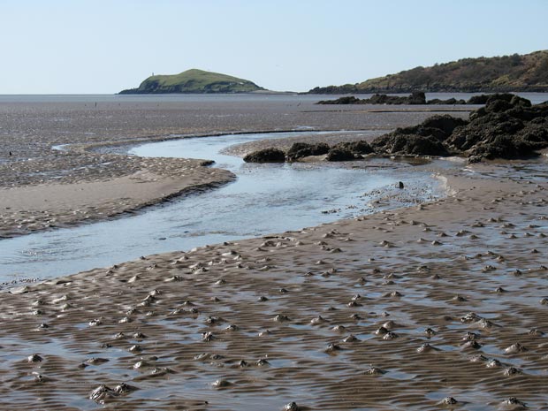 Starting to cross from Rough Island towards Castle Point with Hestan Island in the background.