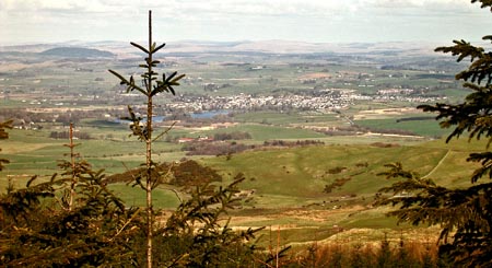 View towards Castle Douglas from the heather ridge on the way from Screel to Bengairn