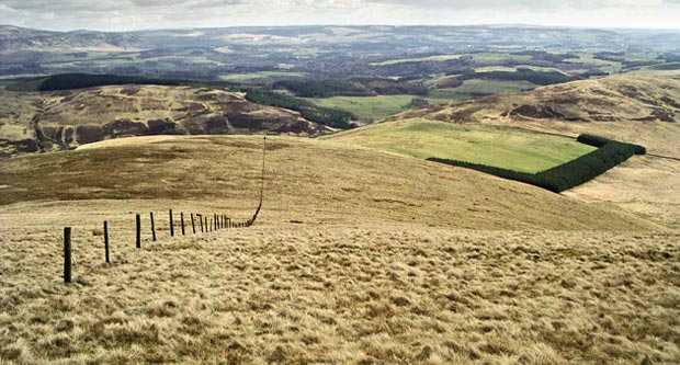 View of Mote Hill while descending towards it from Cairnkinna