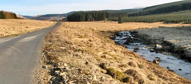 View of single track road running to Lorg alongside Water of Ken